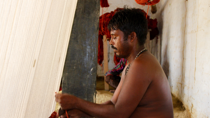Photo of a textile weaver